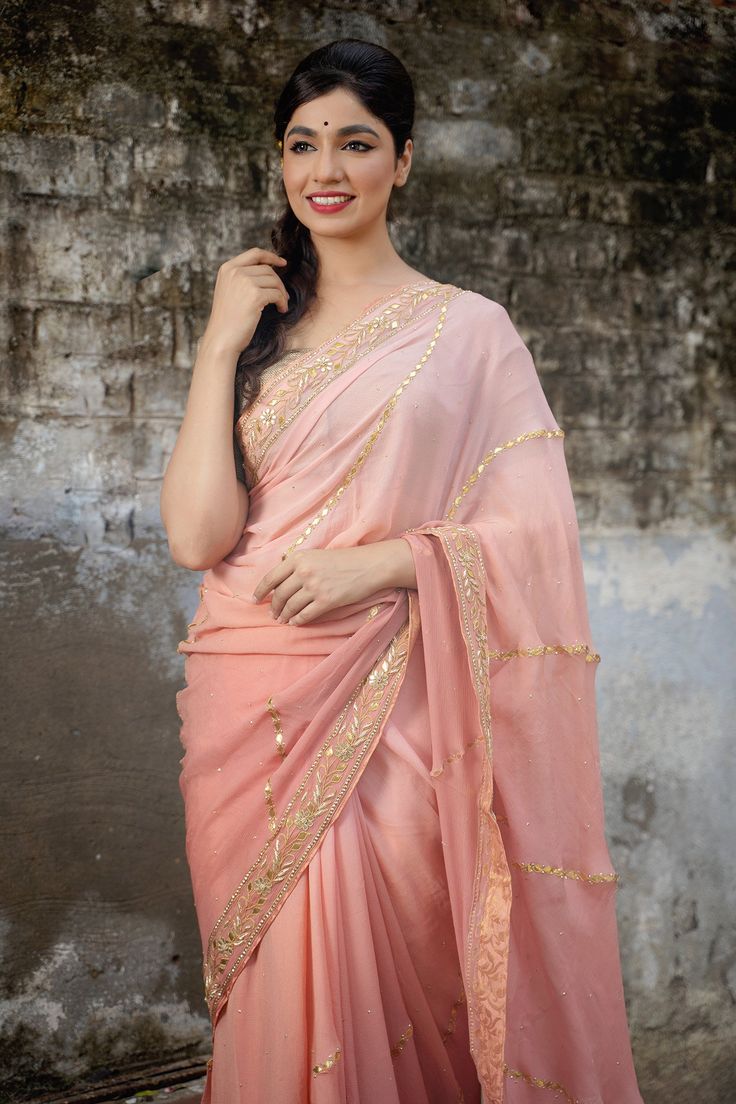 Peach saree highlighted with floral gota patti embroidery. Comes with blouse.
Component: 2
Embroidered
Fabric: Chiffon
Color: Peach - Aza Fashions Gota Patti Embroidery, Peach Saree, Embroidered Saree, Blouse For Women, Embroidered Fabric, Fashion App, Saree With Blouse, Blouse Online, Aza Fashion