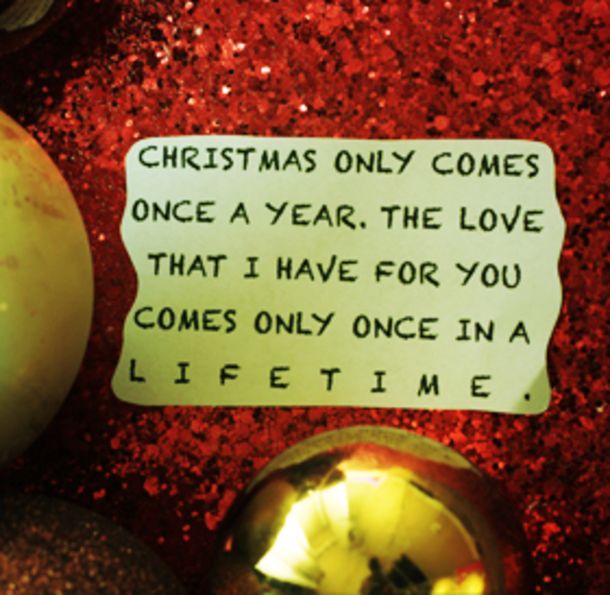 a christmas ornament with a note attached to it