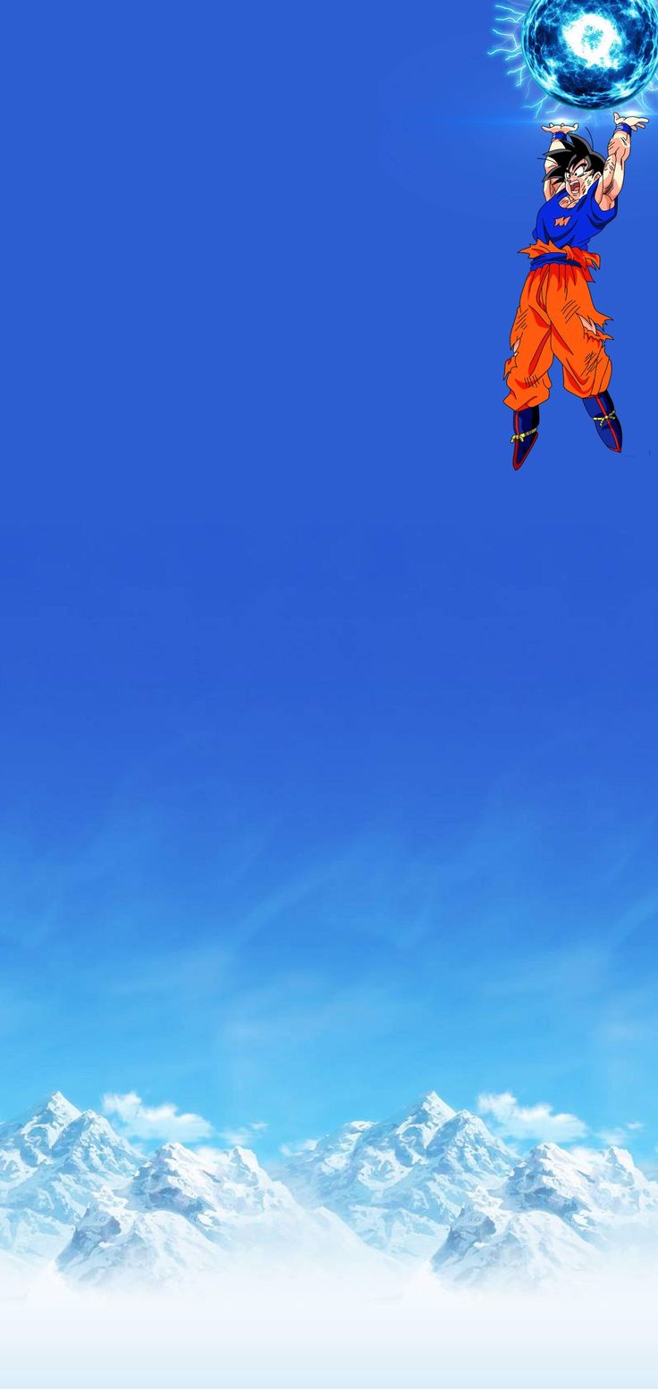 a man flying through the air while holding onto a blue ball in front of snow covered mountains