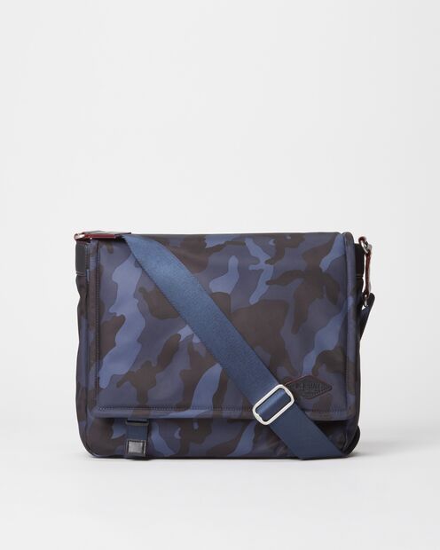 In Dark Blue Camo nylon, meet your new grab-and-go bag. Don't let the Bleecker Messenger's light weight fool you - our premium, water-resistant nylon is tough enough to stow your gear for a weekend day trip, but tailored enough to take to the office come Monday. Mens Messenger Bag For Books, Skull Messenger Bag, Filson 24-hour Tin Briefcase, Military Style Rectangular Outdoor Bag, Mz Wallace, Military Messenger Bag, Bicycle Bag, Go Bags, Blue Camo