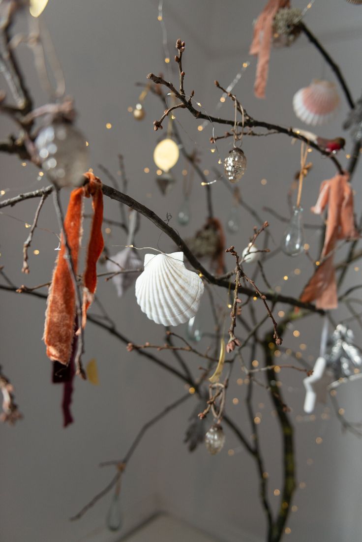 a tree with ornaments hanging from it's branches