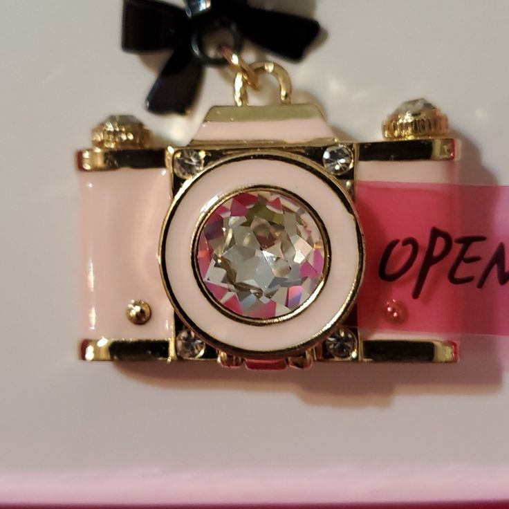 Betsey Johnson Camera Necklace. Camera Opens And Closes With Magnetic Closure. Color: Pink With Gold Color Chain. Pink Metal Jewelry, Pink Metal Jewelry As Fashion Accessory, Pink Metal Jewelry Fashion Accessory, Betsy Johnson Backpack, Camera Necklace, Betsey Johnson Novelty Bags, Betsey Johnson Skull Bag, Betsey Johnson Skull Purse, Betsey Johnson Necklace