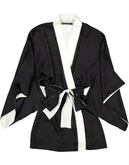 The luxurious black silk satin kimono by Helen Sanchez has full sleeves, a long sash belt and is trimmed with ivory silk. - Approximately 31" from shoulder to hem - 95% silk, 5% Lycra - Made in New York Silk Robe With Kimono Sleeves For Evening, Elegant Long Sleeve Robe For Night Out, Silk Evening Robe With Kimono Sleeves, Silk Long Sleeve Kimono For Evening, Chic Silk Robe With Kimono Sleeves, Chic Formal Satin Robe, Chic Satin Formal Robe, Elegant Long Sleeve Kimono For Night Out, Chic Satin Wrap Kimono