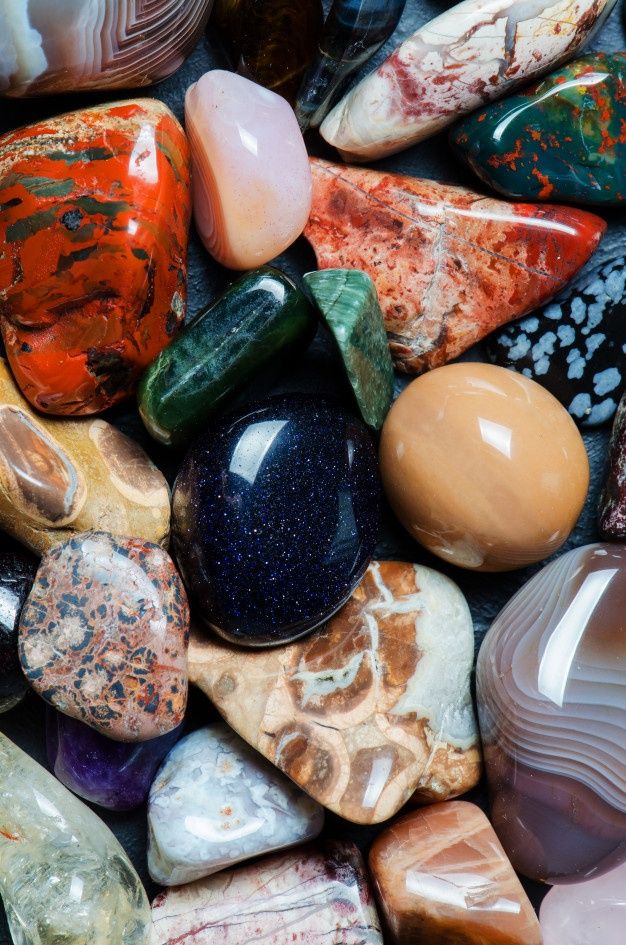 many different colored rocks and stones together