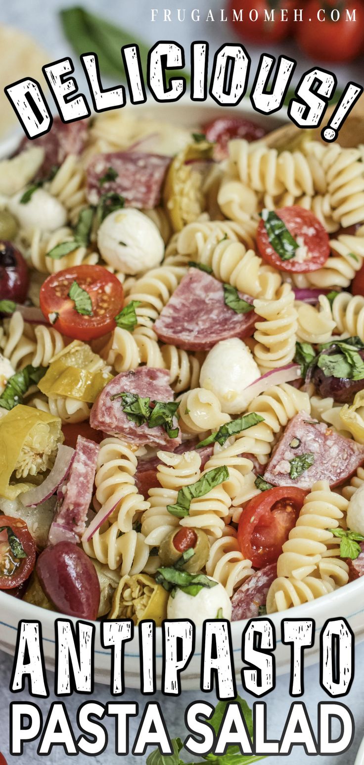 a pasta salad with ham, tomatoes and mozzarella