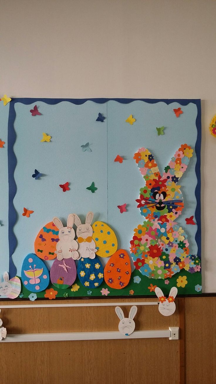 an easter scene made out of paper and cut outs