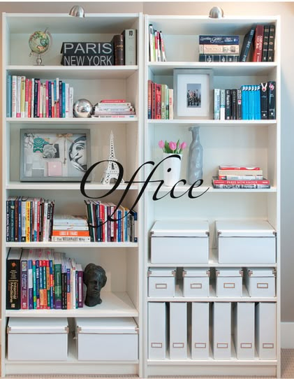 a white book shelf filled with lots of books