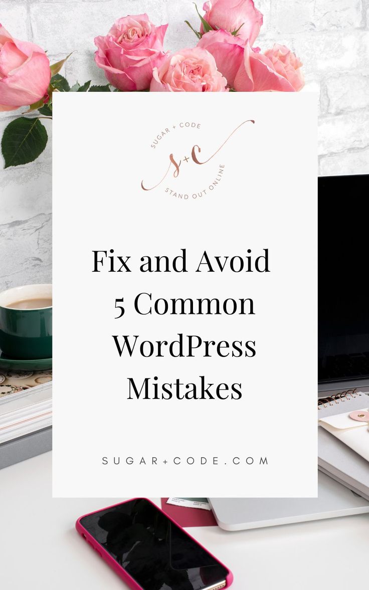 a pink phone sitting on top of a desk next to a white sign that says fix and avoid 5 common wordpress mistakes