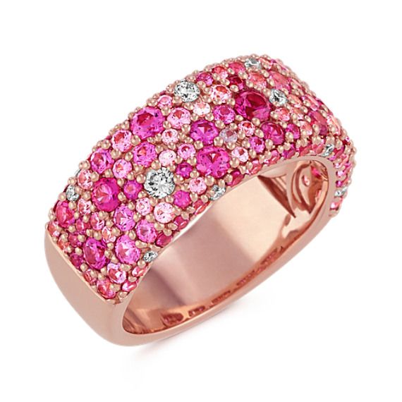 Pink Sapphire and Diamond Ring in Rose Gold | Shane Co. Luxury Pink Multi-stone Ruby Ring, Luxury Pink Diamond Ring With Pink Sapphire, Luxury Pink Multi-stone Sapphire Ring, Luxury Pink Pink Sapphire Diamond Ring, Luxury Pink Rings With Pave Setting, Fine Jewelry Pink Sapphire Diamond Ring, Dazzling Pink Diamond Ring With Accent Stones, Pink Diamond Rings With Pave Setting, Luxury Pink Ruby Ring With Rose Cut Diamonds