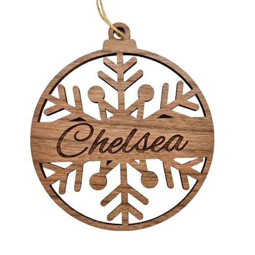 a wooden ornament with the word chelsea on it and an image of snowflakes