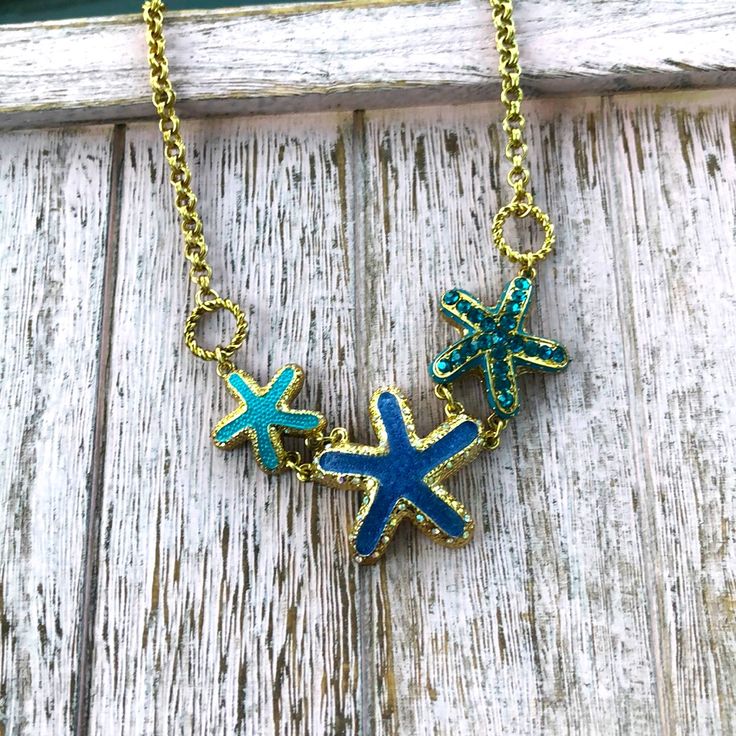 Betsey Johnson Different Shades Of Blue Rhinestones And Sparkles Three Starfish Gold Chain New Never Worn Purple Santa, Ocean-inspired Turquoise Necklace With Starfish Charm, Bohemian Starfish-shaped Turquoise Jewelry, Adjustable Ocean-inspired Necklace With Starfish Charm, Christmas Tree Necklace, Betsey Johnson Jewelry Necklaces, Flamingo Necklace, Betsey Johnson Watches 36 Mm Only, Nautical Necklace