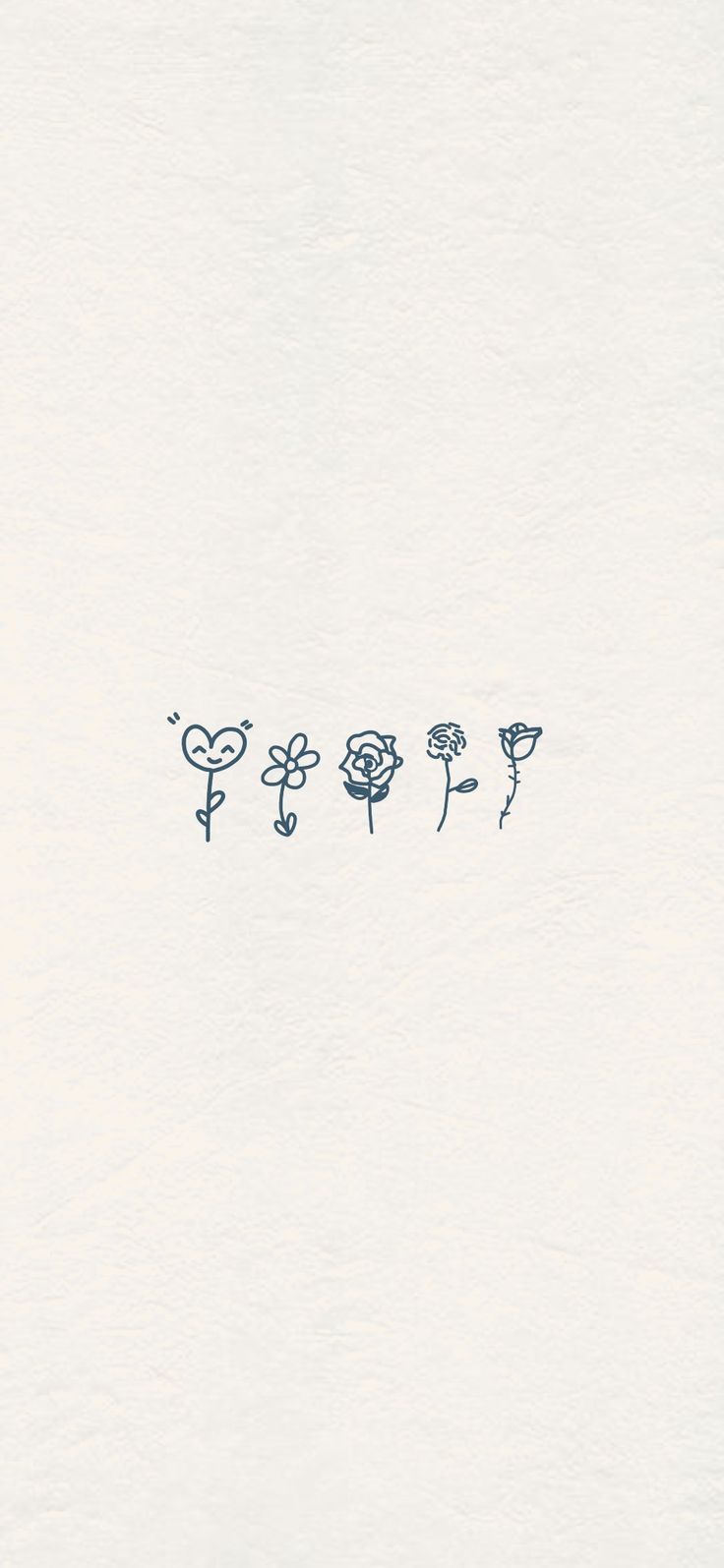 four flowers are drawn in the snow on a white sheet with blue writing that says love