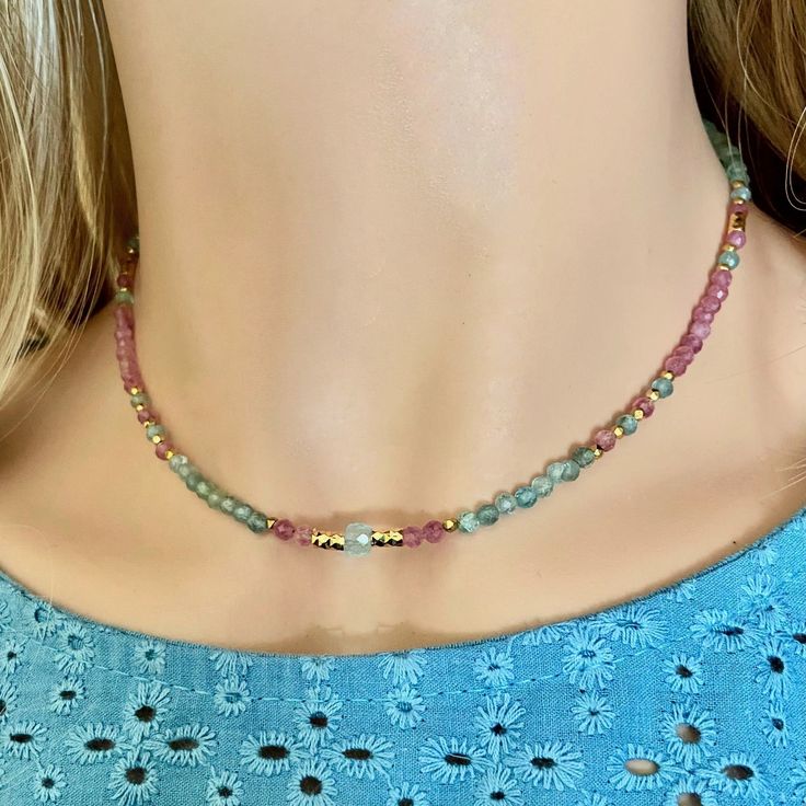 Beaded pink tourmaline and amazonite necklace choker.   Original and very delicate  necklace made of tiny faceted natural stones (3mm)  with 18k gold   plated  hematite  beads and 18k. gold plated thin chain. The middle of necklace is decorated with   very beatiful faceted sky blue aquamarine stone. Details: Necklace assembled on a very durable jewelry wire. Adjustable length-15.4  inch. + 2 in extension chain. Nickel-free stainless steel lobster clasp. Necklace perfectly combined with the brace Multicolor Necklace, Amazonite Necklace, Stones Necklace, Gemstone Beaded Necklace, Clasp Necklace, Aquamarine Stone, Hematite Beads, Jewelry Wire, Necklace Choker