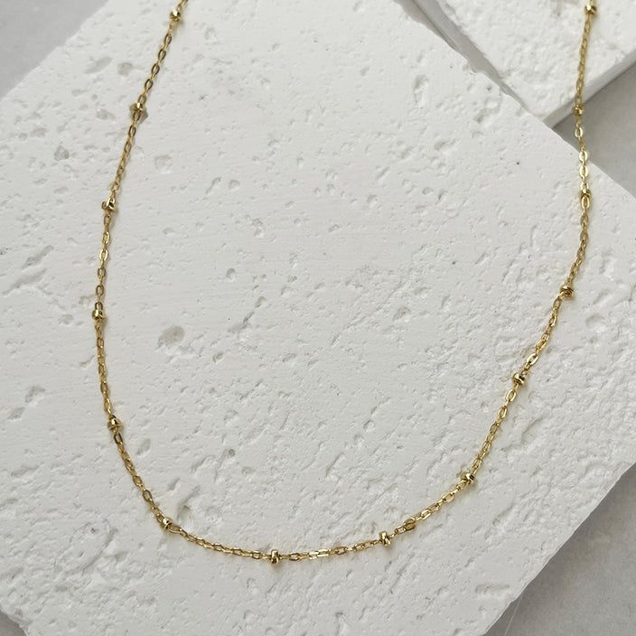 Gold Layered Necklaces, set of 2 necklaces - Goldfilled necklace with one natural pearl and a gold-filled chain necklace.2 separate necklaces so you can wear each necklace separately or together as a layered.Adjustable necklaces - each necklace comes with a 2" extension chain.♥ Necklaces length are 15 inches + 2" extension chain.If you wish for a different size contact us.♥ This necklace set is our recommendation for a Bridesmaid Gift.♥ Comes in a beautiful package ready for gifting. Minimalist Pearl Chain Necklace For Layering, Minimalist Layering Pearl Chain Necklace, Adjustable Choker Necklace With Delicate Chain, Dainty Adjustable Double Strand Chain Necklace, Delicate Adjustable Necklaces For Layering, Gold Pearl Choker With Clavicle Chain, Delicate Gold Beaded Choker Necklaces, Gold Pearl Clavicle Chain Choker, Gold Beaded Pearl Chain Choker Necklace