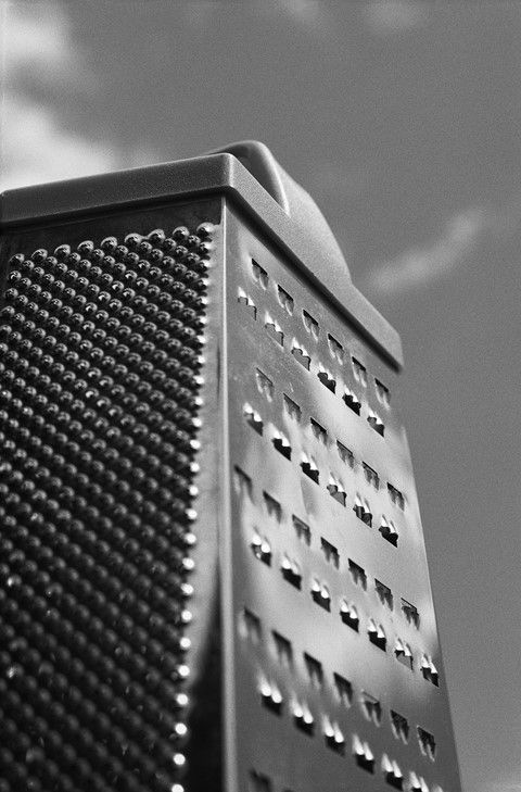 a black and white photo of a metal grate