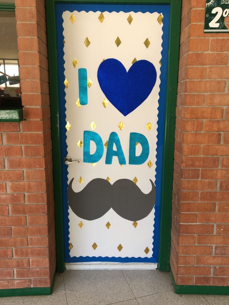 a door decorated with the words i love dad and a mustache