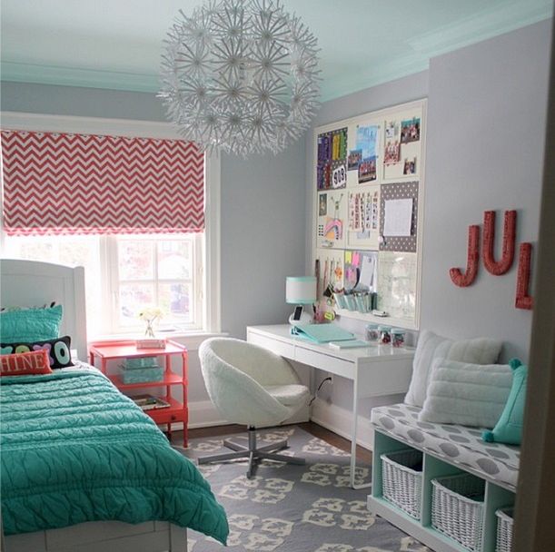 a bedroom with a bed, desk and chair in it's centerpieces