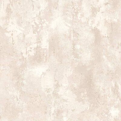 an old, dirty wallpaper background with white paint on the edges and light brown spots