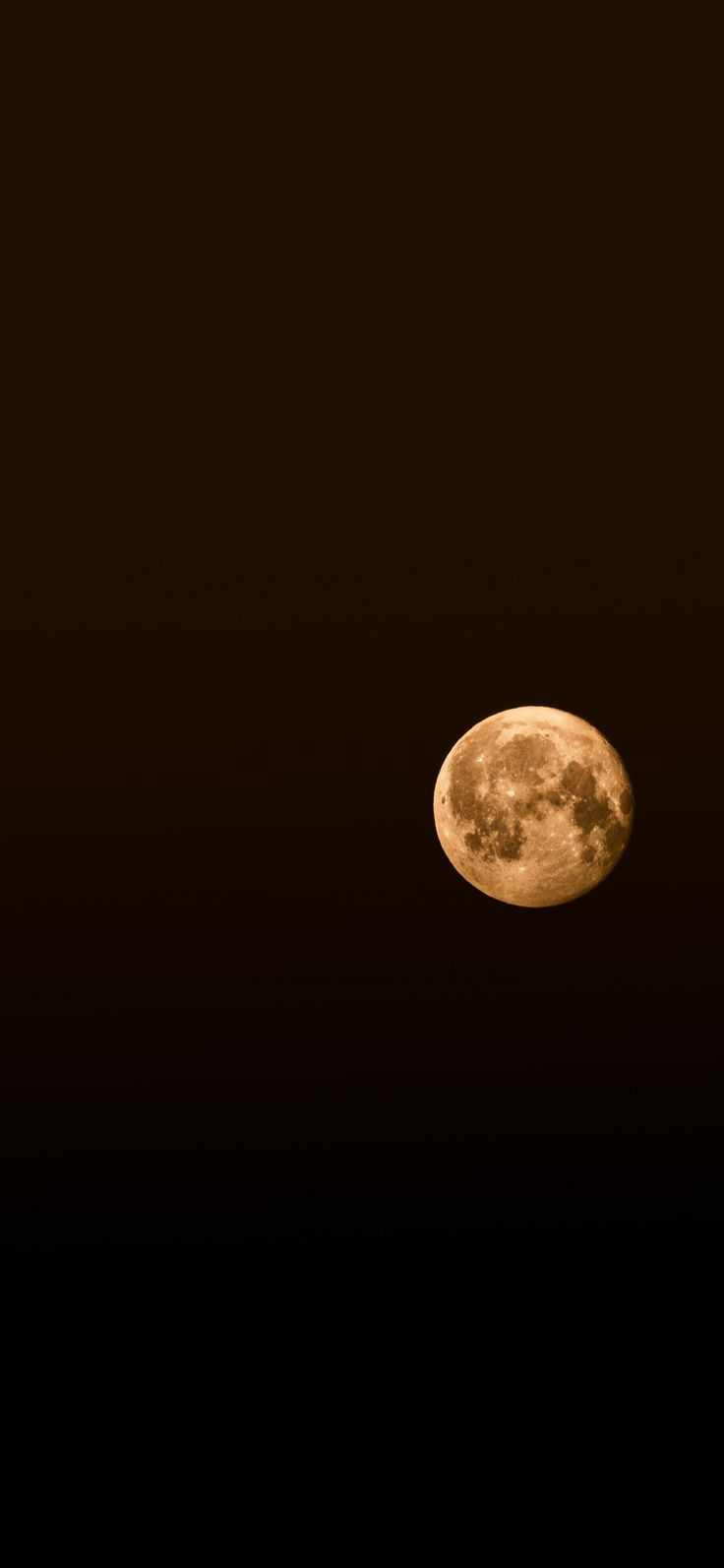 an airplane flying in the sky at night with a full moon behind it and black background