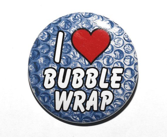 a button that says i love bubble wrap with a red heart on the bottom and blue bubbles around it