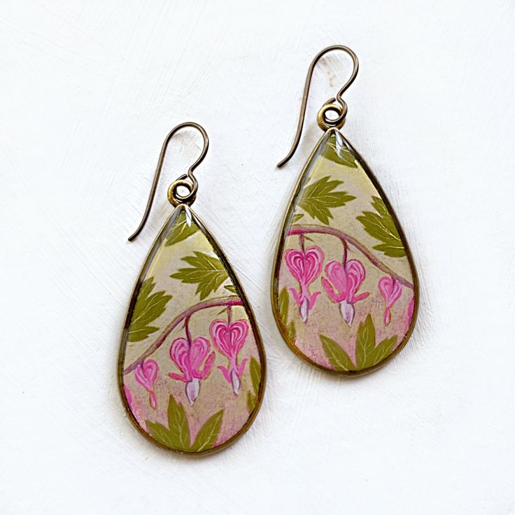 Big teardrop earrings featuring fine art prints of my Bleeding Heart painting. They are comfortable & unique! This image is ©seed&sky Please use this link to return to our home page: https://www.etsy.com/shop/seedandsky/  Our jewelry is handmade in our North Carolina studio.  100% American made components.  Everything is lead-free and nickel-free. Thank you for visiting our Etsy shop! Kelcey & Alex Artistic Heart Earrings As Gift, Artistic Heart-shaped Earrings For Gift, Artistic Heart-shaped Dangle Earrings Gift, Artistic Dangle Heart Earrings As Gift, Artistic Heart-shaped Dangle Earrings For Gift, Artistic Dangle Heart Earrings For Gift, Heart-shaped Hand Painted Earrings As Gift, Artistic Handmade Heart Earrings For Gift, Hand Painted Heart Earrings For Gift