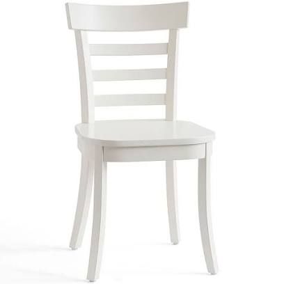 a white wooden chair against a white background