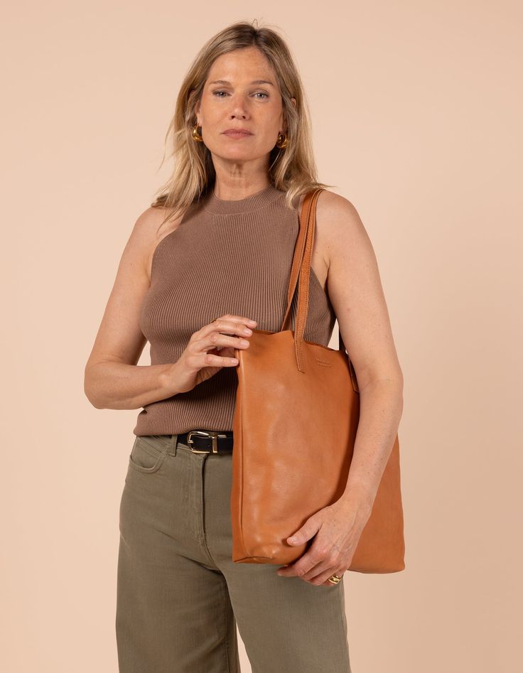 Model image of Georgia wild oak soft grain leather large shopper bag Large Shopper Bag, Sustainable Leather, Her Cut, Inside Bag, Leather Weaving, Dutch Design, Shopper Bag, Classic Leather, Cotton Bag