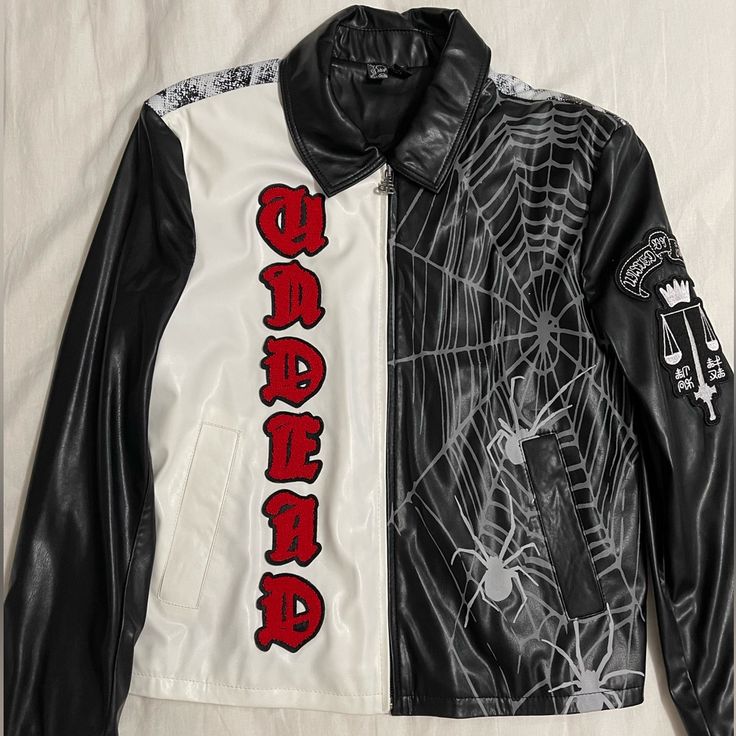 I Believe The Brand Is Drop Dead, States That It’s An Xs; However I’m A Size Small/Medium In Women And It Fits Perfect. So Definitely Is Oversized. Super Cool Faux Leather Jacket. Original Price Is $150, Brand New. Black Patchwork Leather Jacket, Casual Black Leather Jacket With Patchwork, Fitted Leather Jacket For Halloween Streetwear, Casual White Outerwear For Halloween, Fitted Black Leather Jacket With Patchwork, Black Leather Jacket For Halloween Streetwear, White Leather Jacket For Streetwear In Fall, White Leather Jacket For Fall Streetwear, Black Patchwork Biker Jacket For Streetwear