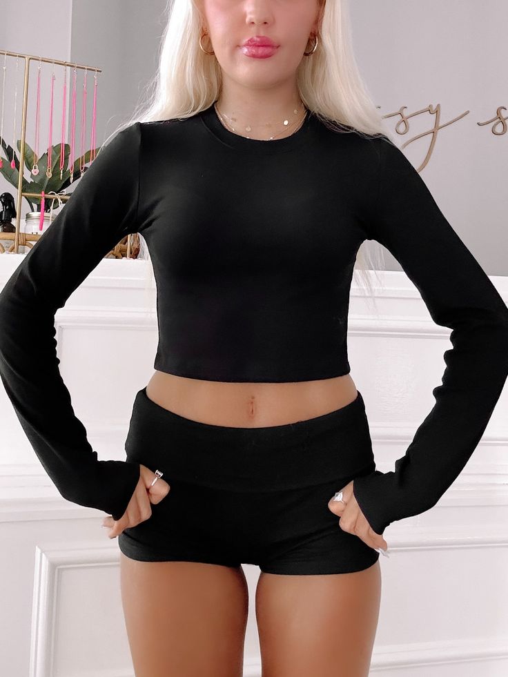 Kendall Long Sleeve Black Top | Sassy Shortcake Trendy Black Crop Top For Loungewear, Versatile Black Crop Top For Loungewear, Trendy Long Sleeve Crop Top For Loungewear, Black Athleisure Crop Top For Fall, Chic Black Crop Top For Loungewear, Long Sleeve Seamless Crop Top For Loungewear, Seamless Long Sleeve Crop Top For Loungewear, Black Ribbed Crew Neck Crop Top, Casual Long Sleeve Seamless Crop Top