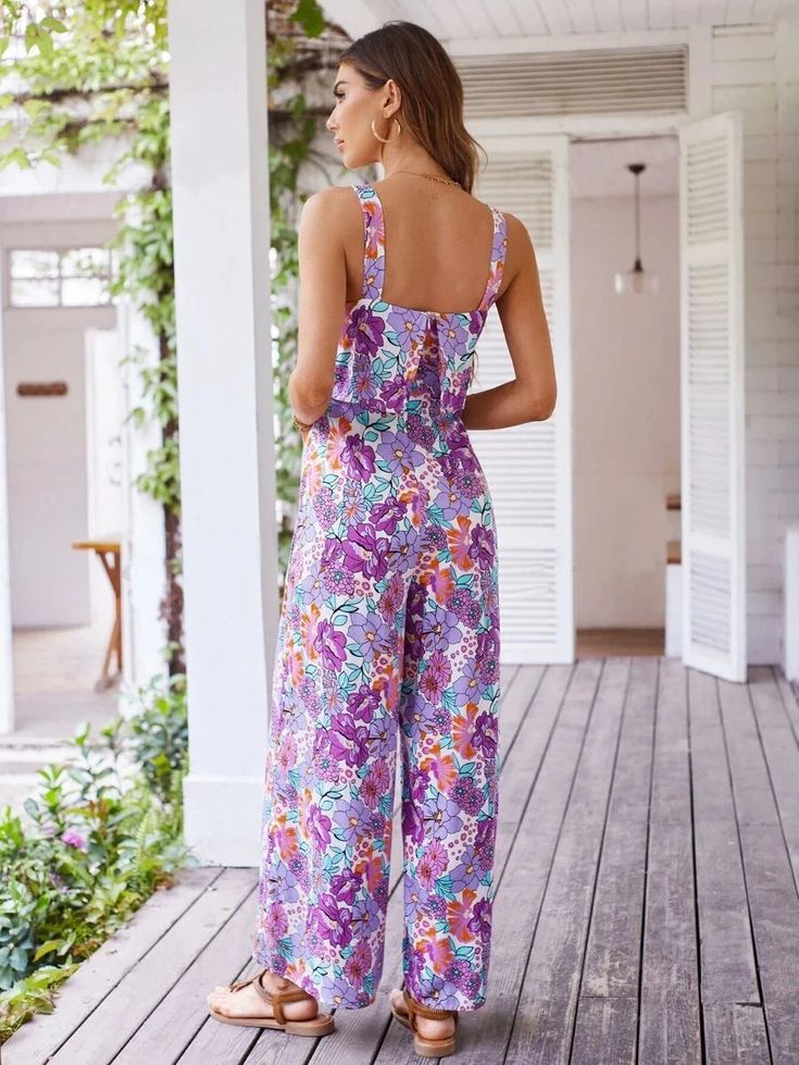 Effortlessly stylish and comfortable, our Elegant Floral Print Backless Casual Jumpsuits are the perfect addition to your wardrobe. The elegant floral print adds a touch of femininity, while the backless design adds a hint of allure. Made with high-quality materials, these jumpsuits are perfect for any casual occasion. Designed by 4COLORDRESS Casual Purple Floral Print Jumpsuits And Rompers, Sleeveless Floral Print Jumpsuits, Sleeveless Non-stretch Floral Jumpsuits And Rompers, Chic Tropical Print Jumpsuits And Rompers For Spring, Floral Print Jumpsuits And Rompers For Garden Party, Purple Sleeveless Jumpsuit For Vacation, Chic Floral Print Jumpsuits And Rompers For Garden Party, Spring Vacation Purple Jumpsuits And Rompers, Non-stretch Floral Jumpsuits And Rompers For Vacation