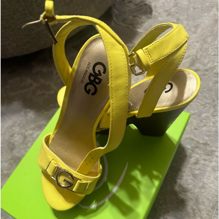 Size 7.5m Yellow Sandals With 4-inch Heel For Summer, Yellow Closed Toe Sandals, Yellow Open Toe Heels With 4-inch Heel, Yellow Summer Wedge Sandals With Open Heel, Yellow Closed Toe Sandals With 4-inch Heel, Yellow Sandals With Heel Strap And Round Toe, Yellow High Heel Sandals With Heel Strap, Yellow Heel Strap Sandals For Summer, Neon Yellow Open Toe Synthetic Sandals