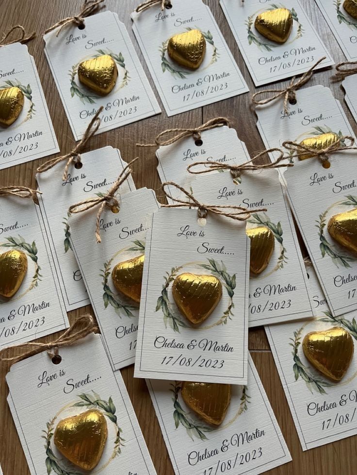 many tags with gold hearts tied to them