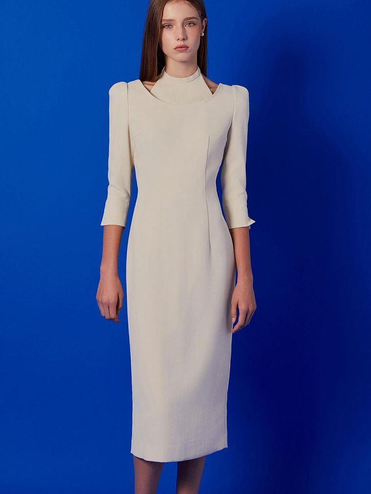 This is a modern and feminine dress by IvanaHelsinki that is made out of high quality and sturdy material. With distinctive mood of the design and comfortable wear, you can style it for your modern daily outfit.- Light high density wool like fabric- H line silhouette- Layered design and slim waist Elegant Fitted Midi Dress For Winter, Elegant Beige Midi Dress For Winter, Fitted Winter Midi Dress For Office, Chic Wool Party Dress, Spring Fitted Midi Dress With Structured Boning, Fitted Midi Dress With Structured Boning For Spring, Fitted Dress For Office Wear In Fall, Chic Fitted Midi Dress For Semi-formal Occasions, Structured Formal Dress For Fall