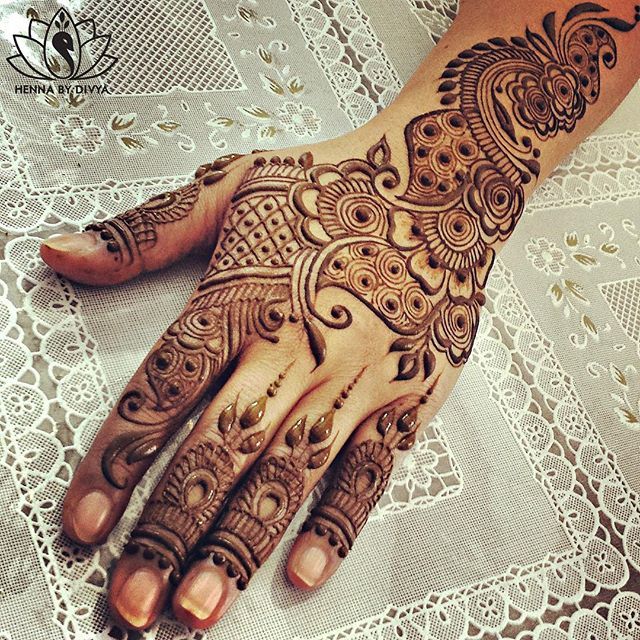 a henna tattoo on someone's hand