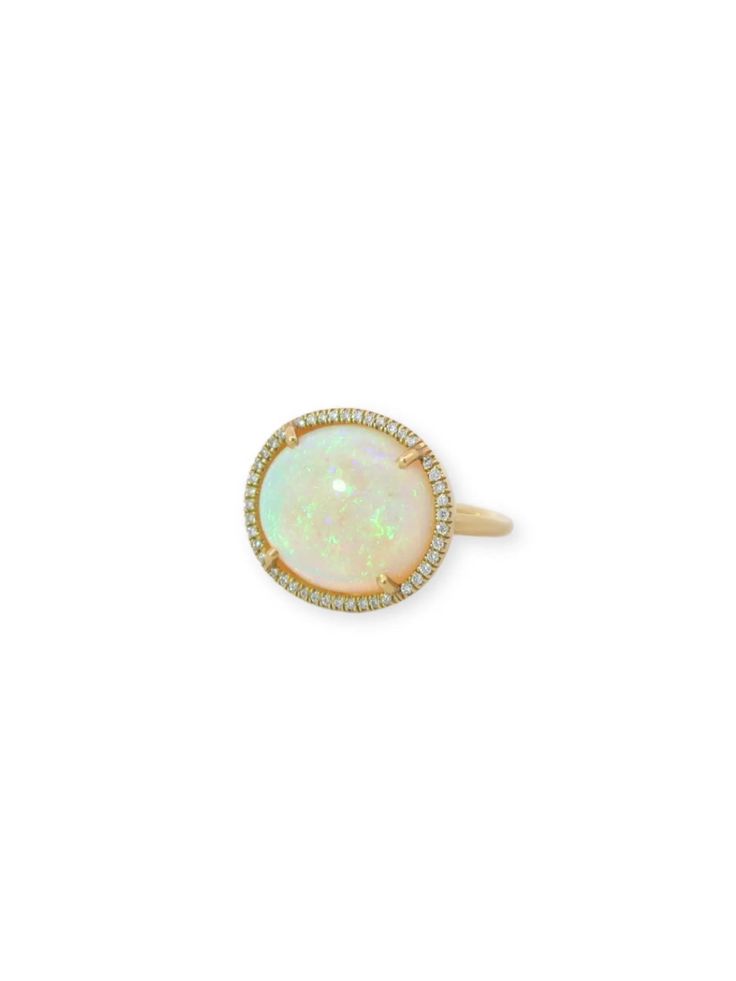 Introducing an extraordinary piece from Irene Neuwirth's One-Of-A-Kind Collection, this 18k yellow gold ring is a true masterpiece. Handcrafted with meticulous attention to detail, it showcases a mesmerizing opal weighing approximately 9 carats, surrounded by a halo of dazzling full-cut diamonds. Crafted with the utmost precision and artistry, this one-of-a-kind ring is made from 18-karat yellow gold, exuding a warm and luxurious glow. The opal, with its captivating play of colors, adds a touch of enchantment and uniqueness to the design. Surrounding the opal, the full-cut diamonds with a total weight of 0.15 carats (G-H color/VS-SI clarity) provide a brilliant frame, enhancing the opal's beauty and radiance. With a ring size of 6.5, this exquisite piece is ready to adorn your finger and m Exquisite Yellow Gold Opal Gemstone Ring, Luxury 14k Gold Jewelry With Halo Design, Luxury Yellow Gold Opal Ring, Exquisite Yellow Gold Opal Ring Gift, Luxury Yellow Gold Halo Ring With Gemstone, Fine Jewelry Opal Ring With Halo Setting, Luxury Yellow Gold Opal Ring With Brilliant Cut, Luxury 14k Gold Halo Design Jewelry, Exquisite 14k Yellow Gold Rings