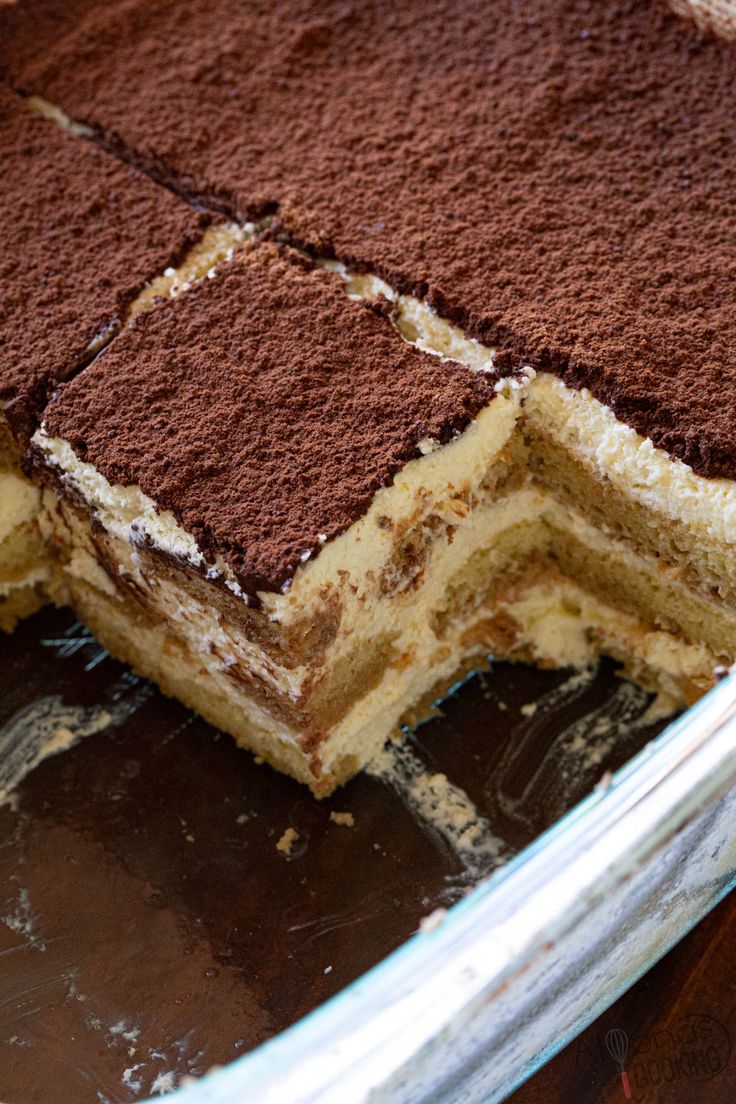 there is a cake that has been cut in half and ready to be served on the table