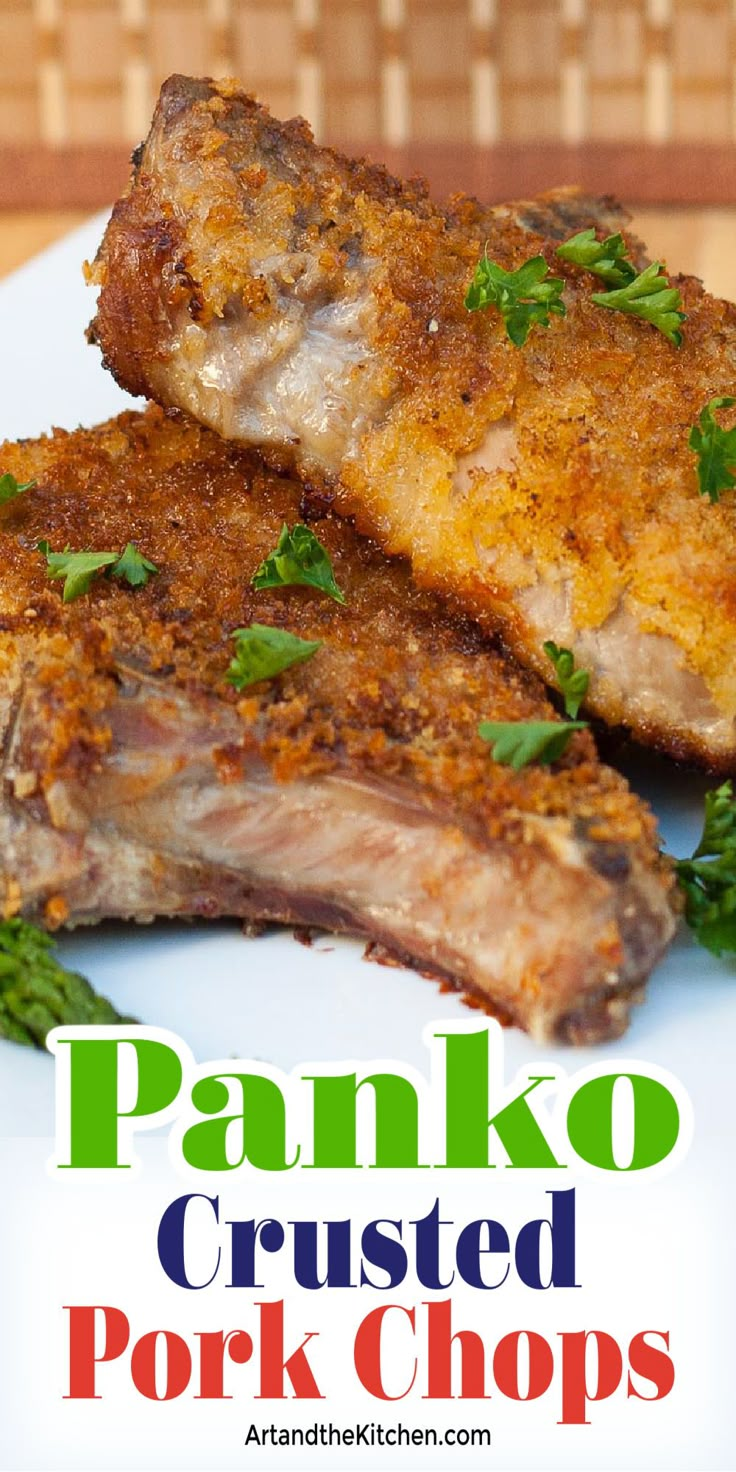 panko crusted pork chops on a plate with parsley sprigs