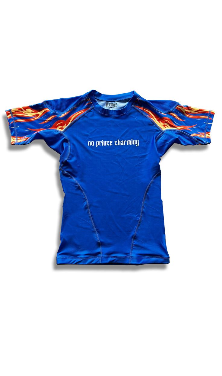 a blue shirt with an orange and red design on it