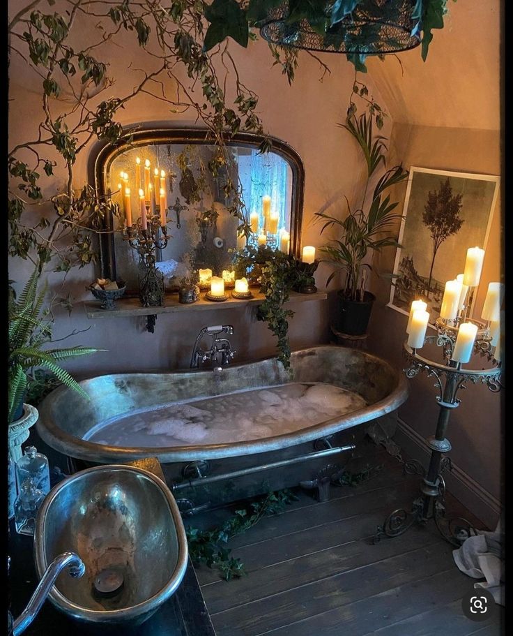 an old fashioned bathtub with candles in it