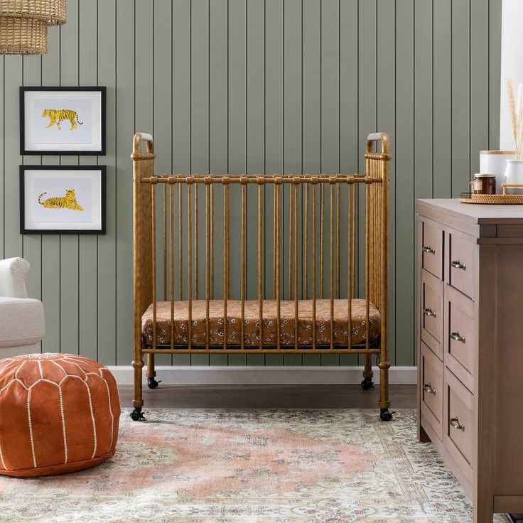 a baby crib in the corner of a room