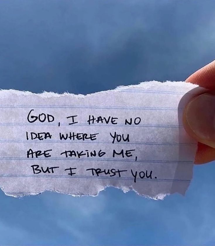 someone holding up a piece of paper that says god, i have no idea where you are trying me but i trust you