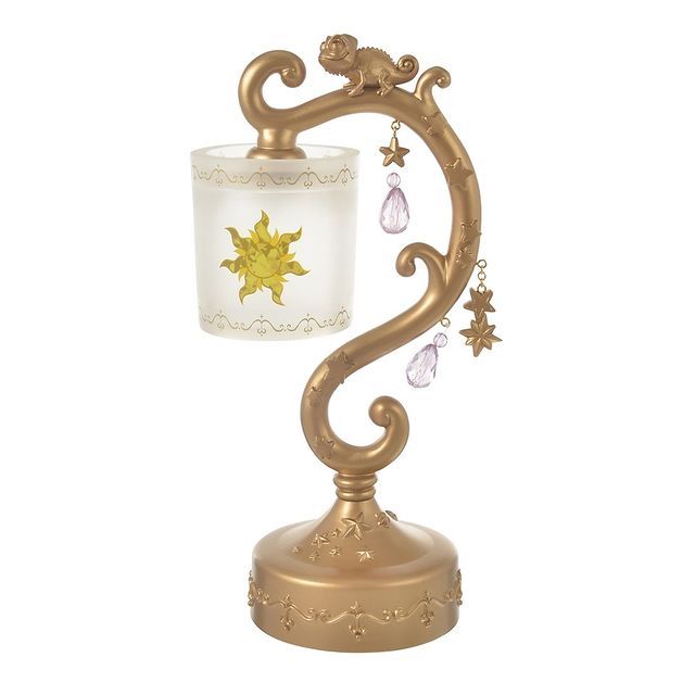 a lamp that is on top of a stand