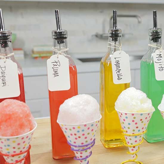 four ice cream cones are lined up on a counter with labels that say i love you