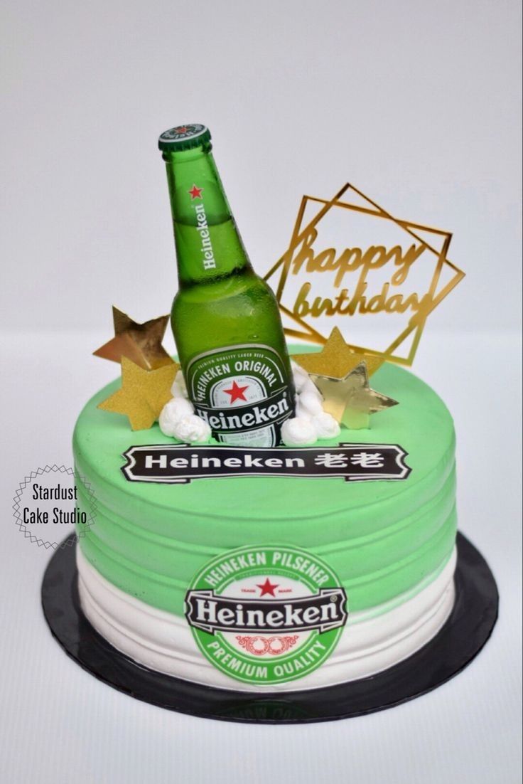 a birthday cake with a beer bottle on top