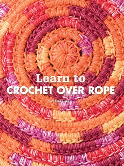 the cover of learn to crochet over rope, with an orange and pink circular design