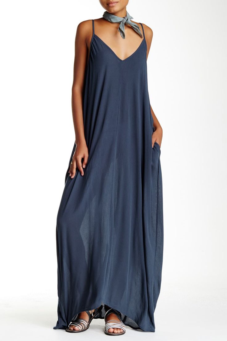 Whether you are hanging out at the pool or beach, this relaxed fitting gauze maxi dress is light enough to keep you cool on the warmest day.Fit: this style runs large, order one size down. V-neck. Adjustable spaghetti straps. V-back. 2 side seam pockets. Solid color. Crinkled woven construction. Approx. 58" length (size S-M). Imported Breezy V-neck Maxi Dress For Beach Season, Flowy V-neck Breezy Maxi Dress, V-neck Unlined Maxi Dress For Beach, Unlined V-neck Maxi Dress For Beach, V-neck Maxi Dress For Beach Season Loungewear, Breezy V-neck Beach Dress For Daywear, Flowy Daywear Maxi Dress, Flowy Unlined Maxi Dress For Daywear, Flowy V-neck Maxi Dress For Beach Cover-up