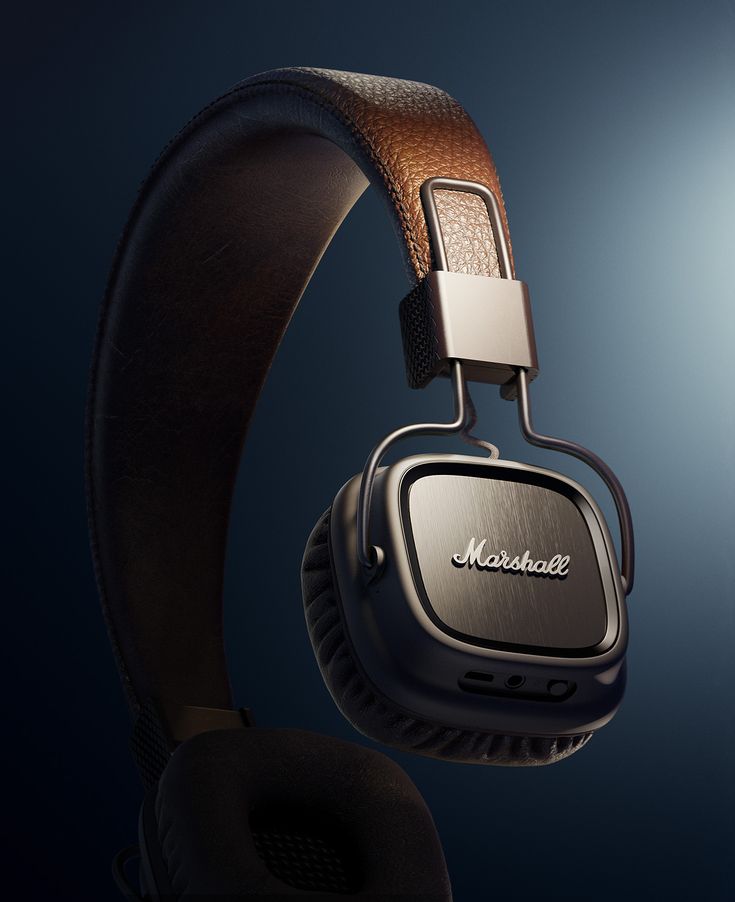 the marshall headphones are on display against a dark background