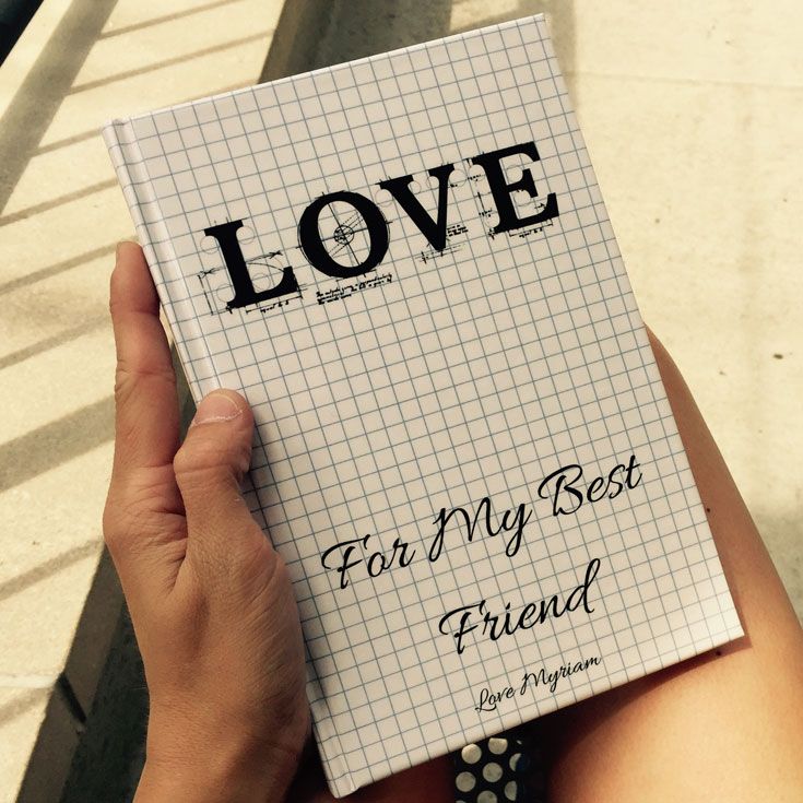 someone holding up a book with the words love for my best friend written on it