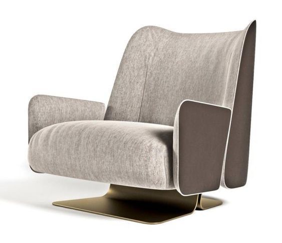 the modern chair is upholstered and ready to be used as a lounger