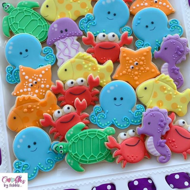 decorated cookies in the shape of sea animals